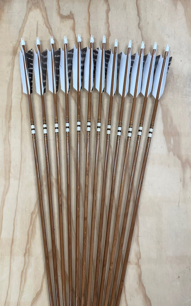 50-55# Eagle tapered arrows, Sitka Spruce, Brown stain with white cresting