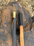 Pacific Yew takedown longbow, with rawhide back and Elk antler tips.