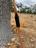 Pacific Yew takedown longbow, with rawhide back and Elk antler tips.